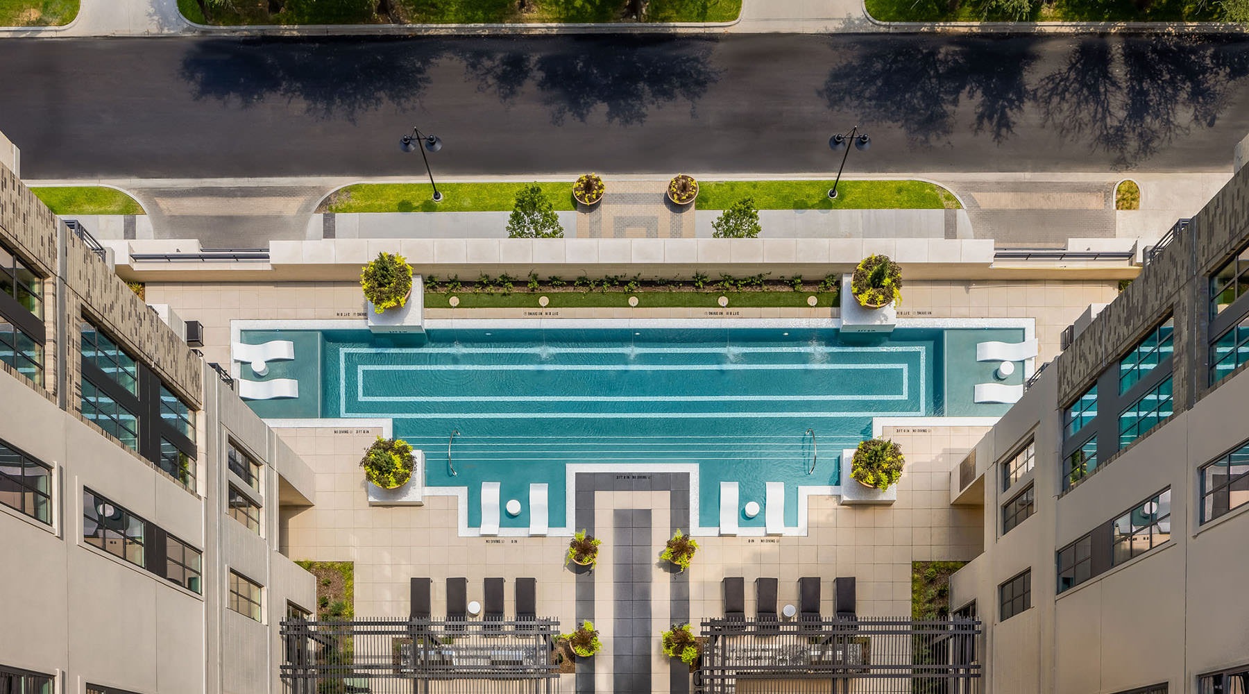 Relax and Unwind Poolside aerial view of a pool