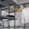 a room with clothes on shelves