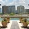 a pool and a deck with a view of a city