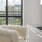 a chair in front of a window