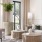 a room with a large window with seating