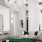 a lobby with a chandelier and a couch