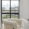 a white chair in front of a window