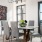 a dining room table with chairs around it